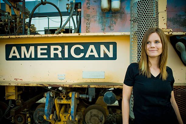 young american woman and train stock photo