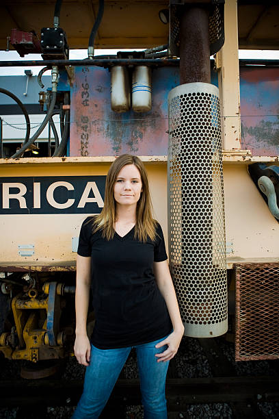 young woman near a train stock photo