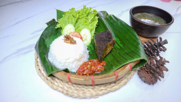 istock fried spleen food on a banana leaf 1447997985