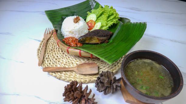 istock fried spleen food on a banana leaf 1447998568