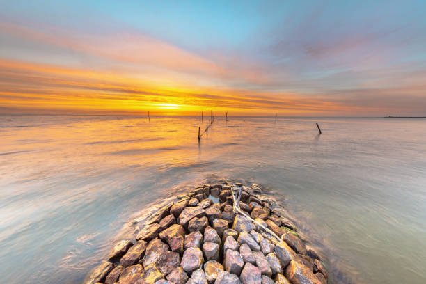 istock Breakwater IJsselmeer at sunset 1447999416