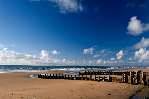 Barmouth is a town in the county of Gwynedd, north-western Wales, lying on the estuary of the River Mawddach and Cardigan Bay.