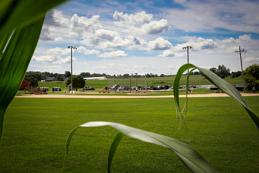 Dyersville, Iowa, USA - July 26, 2022: A view from the cornfield of the Lansing family farm with the baseball diamond that was the movie set for the 1989 film Field of Dreams.