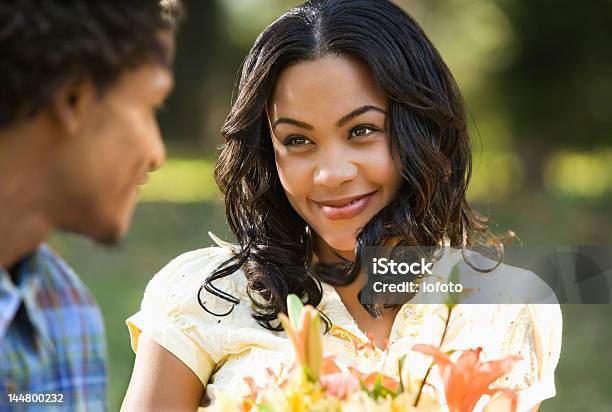 Couple At Park Stock Photo - Download Image Now - African-American Ethnicity, Couple - Relationship, Flower