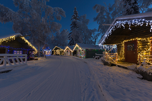 Historical cabins decorated for the holidays in Fairbanks, Alaska.