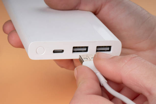 istock hand connect usb for white portable  power bank 1448004945