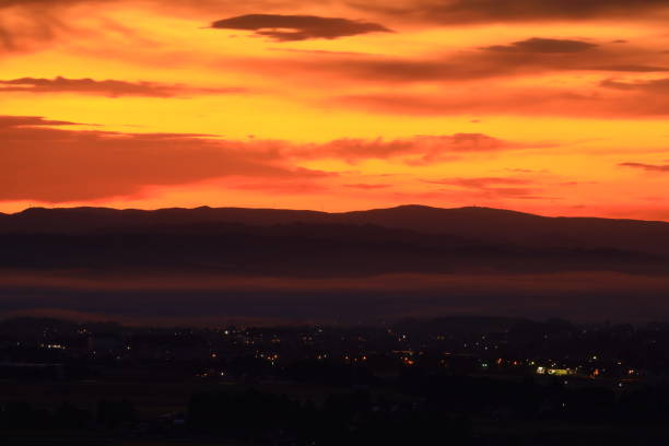 istock cityscape at sunrise 1448005074