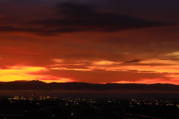 istock cityscape at sunrise 1448005075
