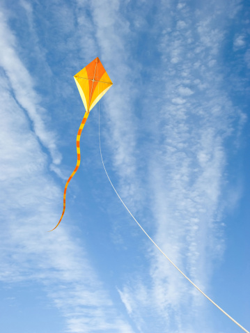 A kite flying on blue sky