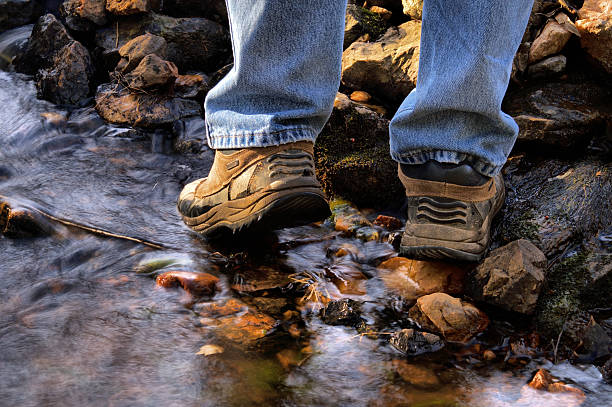 istock Active Outdoor Hiking In Stream Bed 144800931