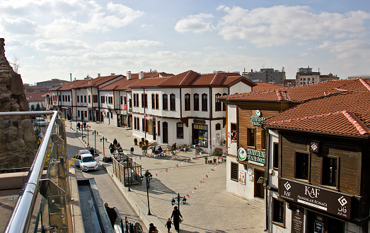 Ankara, Turkey - November 27, 2022: A day view of old bazaar that called Hacı Bayram Veli. Hacı Bayram Mosque and bazaar was built by Architect Mehmet Bey in Ankara, Turkey in 1427. Today people visit the building for shopping and praying.