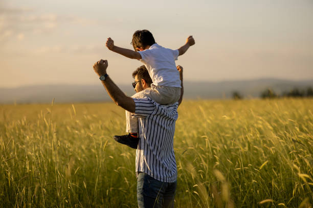 istock Dad and son outdoors 1448010195