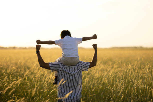 istock Dad and son outdoors 1448010238