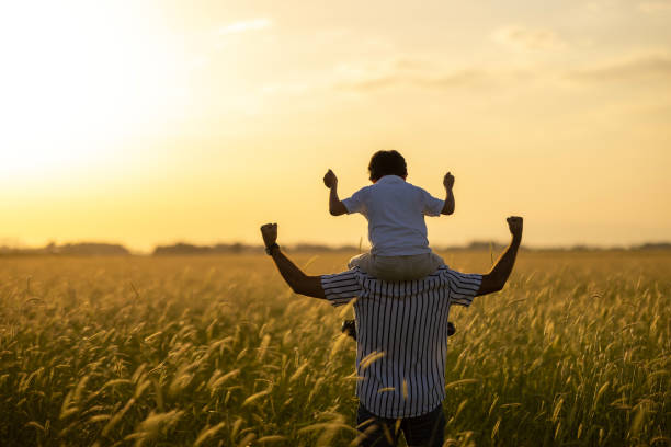 istock Dad and son outdoors 1448010240