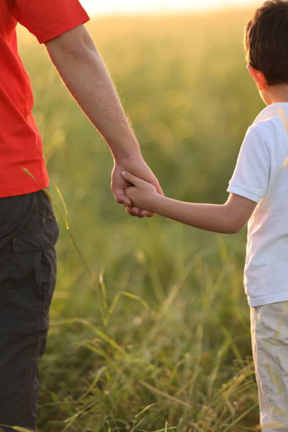 istock Dad and son outdoors 1448010292