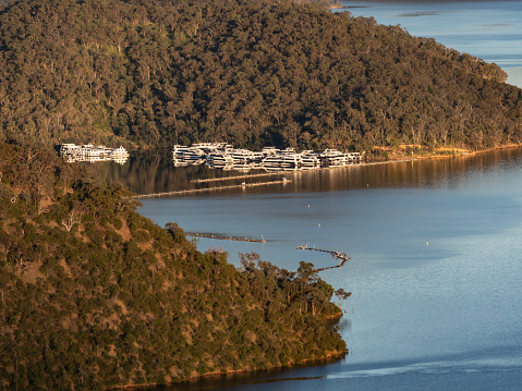 Morning light on inlet with house boat rentals at Lake Eildon
