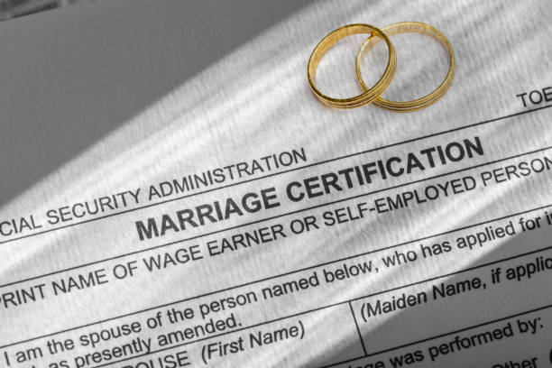 Marriage certificate form with two alliances Official United States Forms marriage certificate stock pictures, royalty-free photos & images