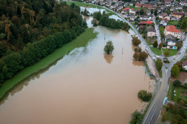 istock Torrent from a mountain stream ripping through the forest, aerial view 1448014074
