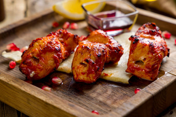 istock shish kebab from sturgeon on wooden board macro close up 1448016778