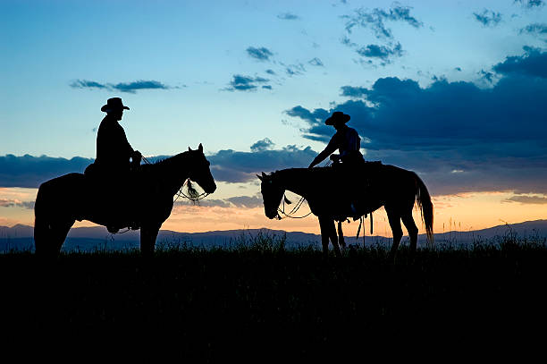 istock Cowboy silhouettes at dawn (see others in my portfolio/lightbox) 144801801