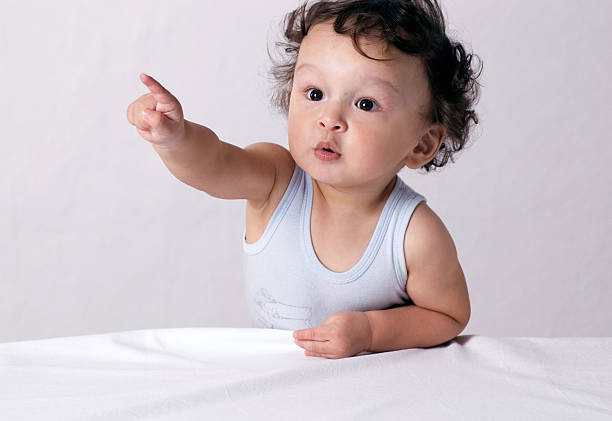 Portrait of the child on alight background.