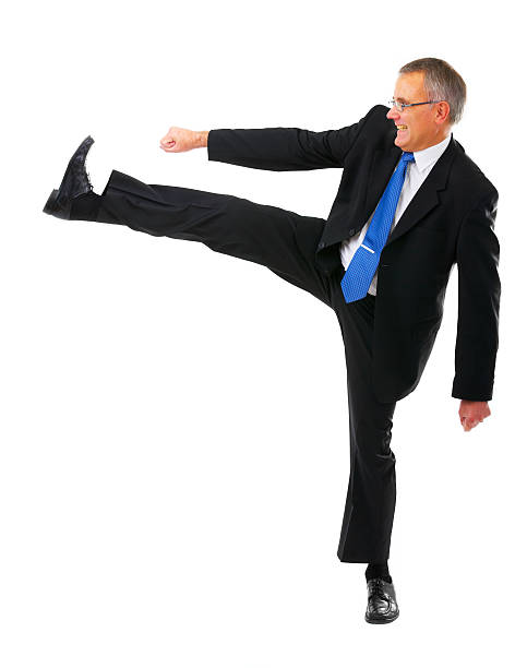 istock Businessman kicking and punching 144802163