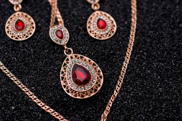 istock Set of golden set with diamonds over black background 1448022026