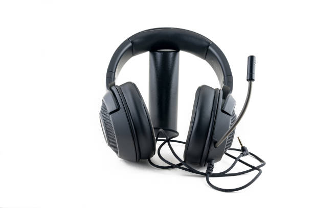 istock Black headphones on white background 1448022560