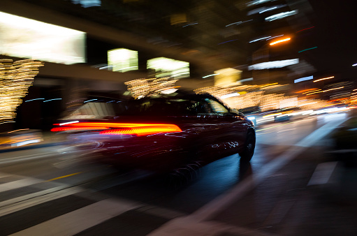 Blurred motion: Black car in the night
