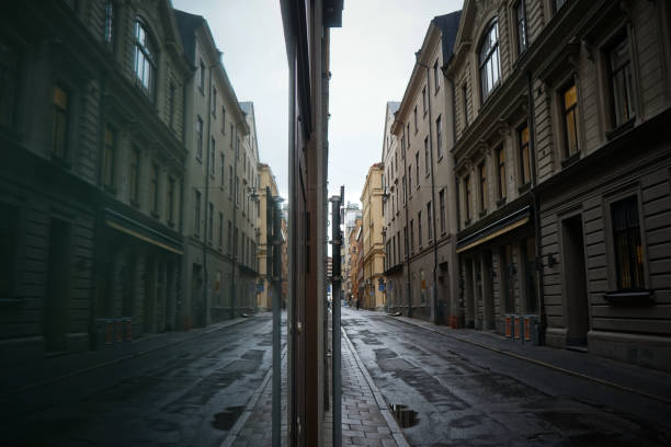 istock Empty road amidst buildings in a city 1448025206