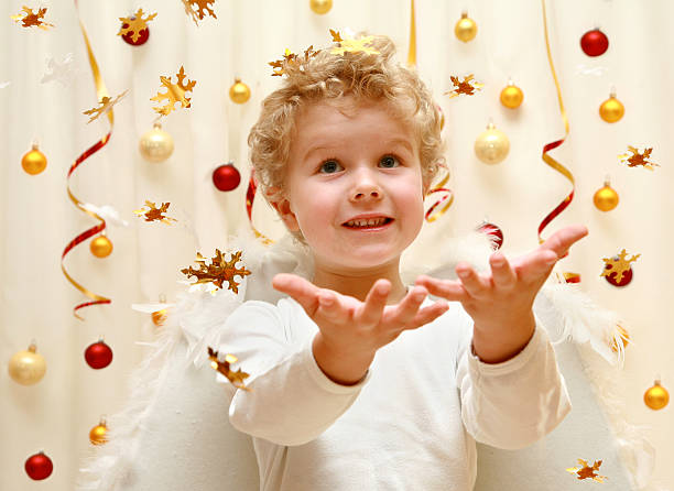 sweet angel with holding hands stock photo