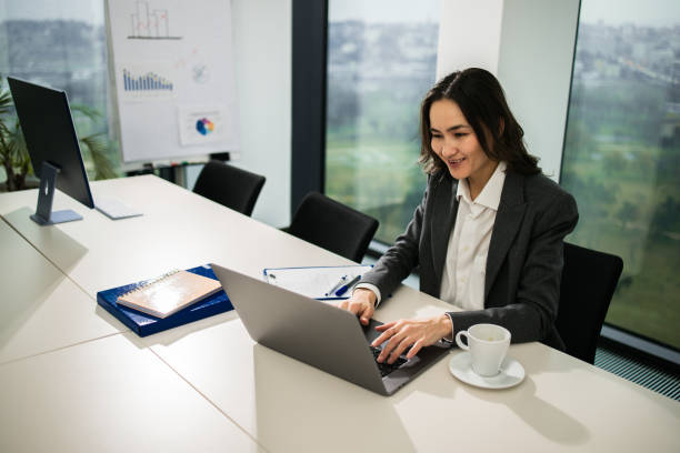 istock Businesswoman working in a modern office 1448027480
