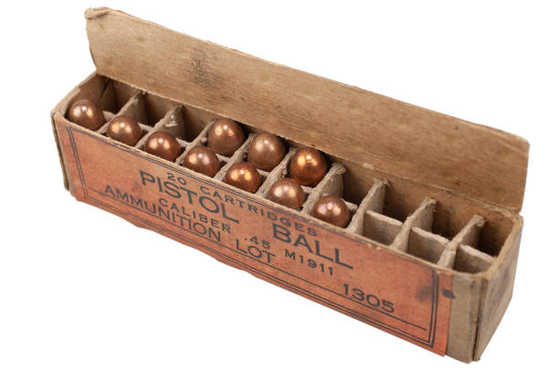 istock Pistol ball caliber .45 M1911 box with cartridges 1448027534