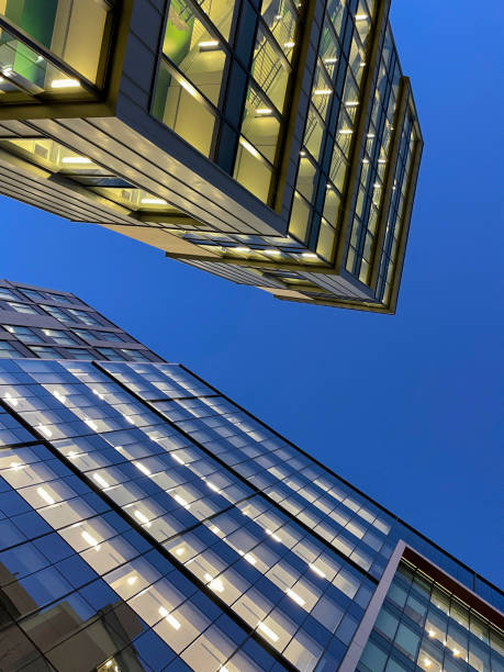 istock Modern glass buildings against a blue sky at dusk 1448029654