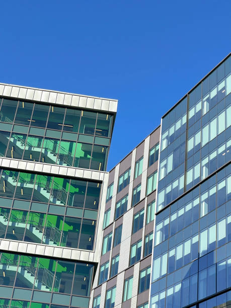 istock Modern glass buildings against a blue sky 1448029673