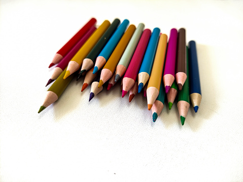 Pencil colors isolated on white background. Selective focus image