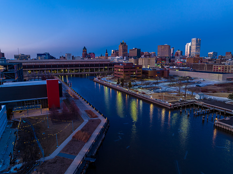 Aerial View of Downtown Milwaukee at dusk viewed from the West. Menomonee River in foreground