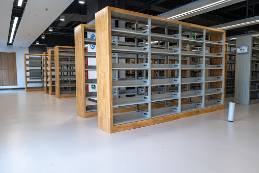 Empty bookcases in the library