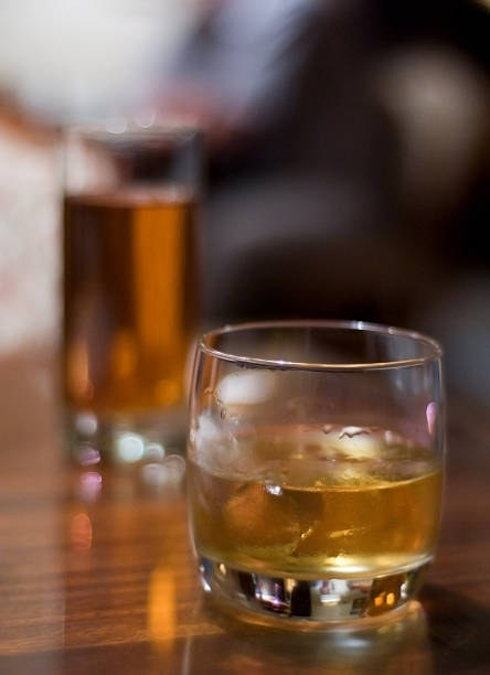 Whisky with apple juice stock photo