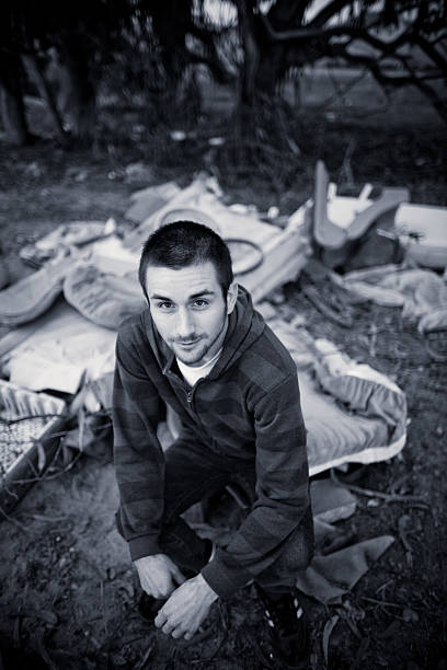 man in the trash stock photo