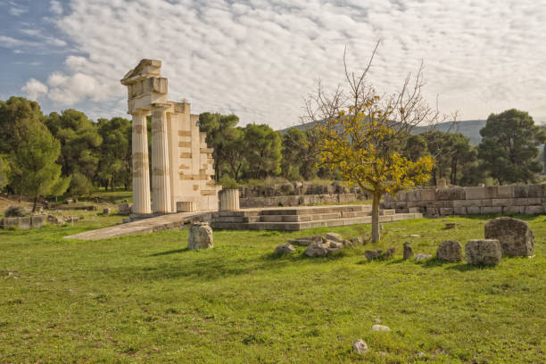 istock Temple of Asclepius at Epidavros, Greece, with single tree in foreground 1448049438
