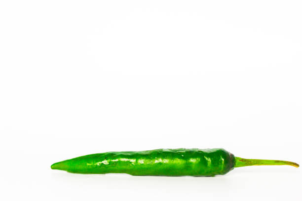 istock Green Cayenne Pepper. Isolated. Copy Space 1448055022
