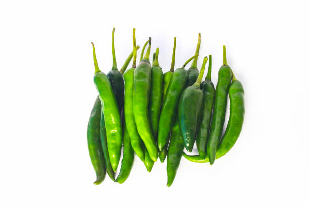 istock Green Cayenne Peppers. Isolated. Copy Space 1448055537