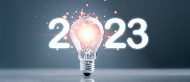 istock 2023 lightbulb with glowing light sparkling effect. Concept of 2023 goals, ideas, target, business strategy, success, action plan, growth, market, development, investment, innovation technology. 1448059653
