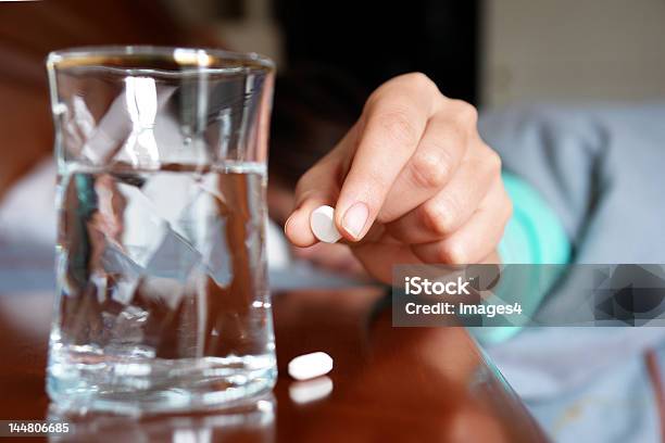 Woman With A Flu Taking Pill Stock Photo - Download Image Now - Sleeping, Sleeping Pill, Medicine