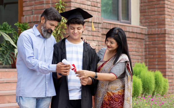 istock Indian university boy student and proud parents celebrating graduation degree convocation ceremony 1448069293