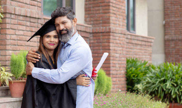istock Indian university female student and her father celebrating graduation degree convocation ceremony 1448069328