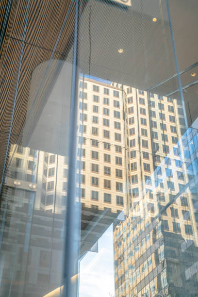istock Austin, Texas- Reflection of a multi-storey building on a glass window wall 1448071372