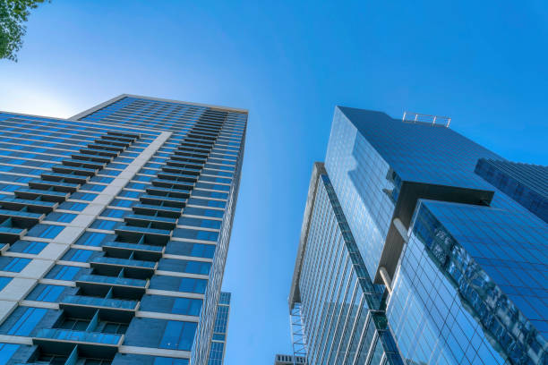 istock Two modern skyscrapers in a low angle view at Austin, Texas 1448071464