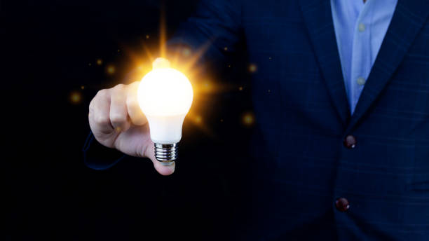 istock Bright idea in hand Business man,Hands holding light bulb for concept new idea concept with innovation and inspiration,technology in science and communication concept 1448074410